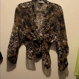 This beautiful camouflage T-shirt button up!